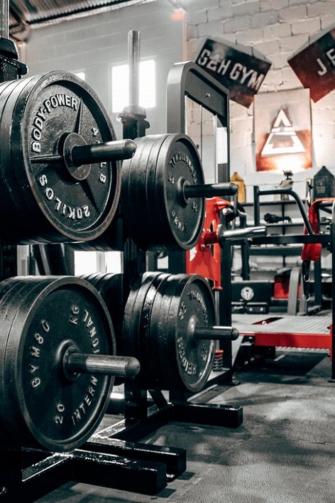 Weight plates stacked on a stand